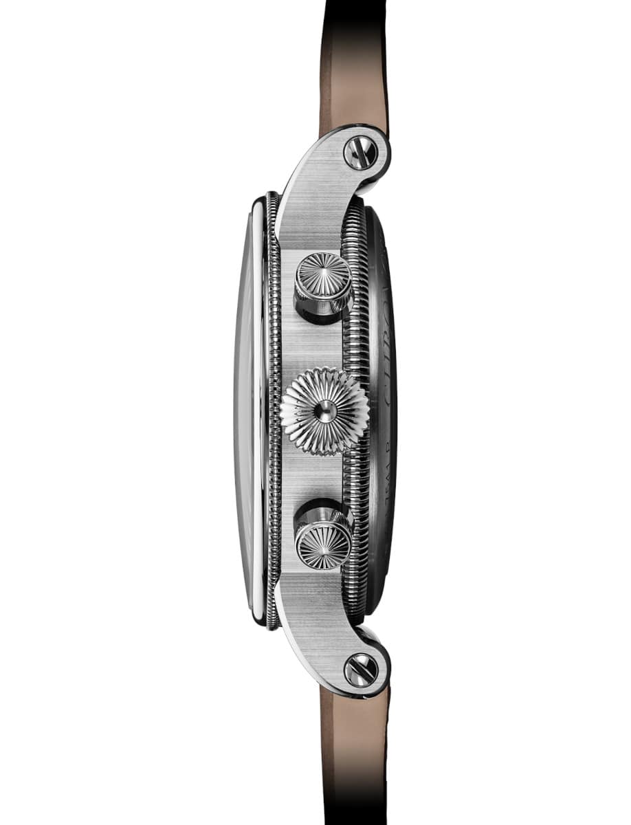 Side view of crowns of Chronoswiss wristwatch with grade 5 titanium case, and sand-colored Nubuk leather.