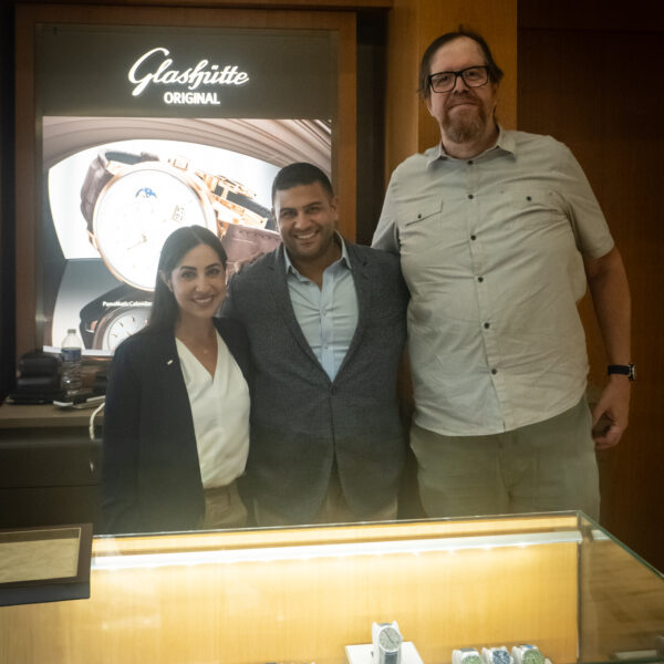 Guests and reps from Glashutte Original on the counter at Feldmar's World Watch Day event