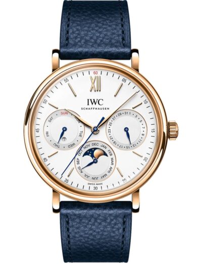 IWC wristwatch with 18k 5N Gold case, silver-plated dial, and blue calfskin strap. | Feldmar Watch Co. IWC wristwatch with 18k 5N Gold case, silver-plated dial, and blue calfskin strap.