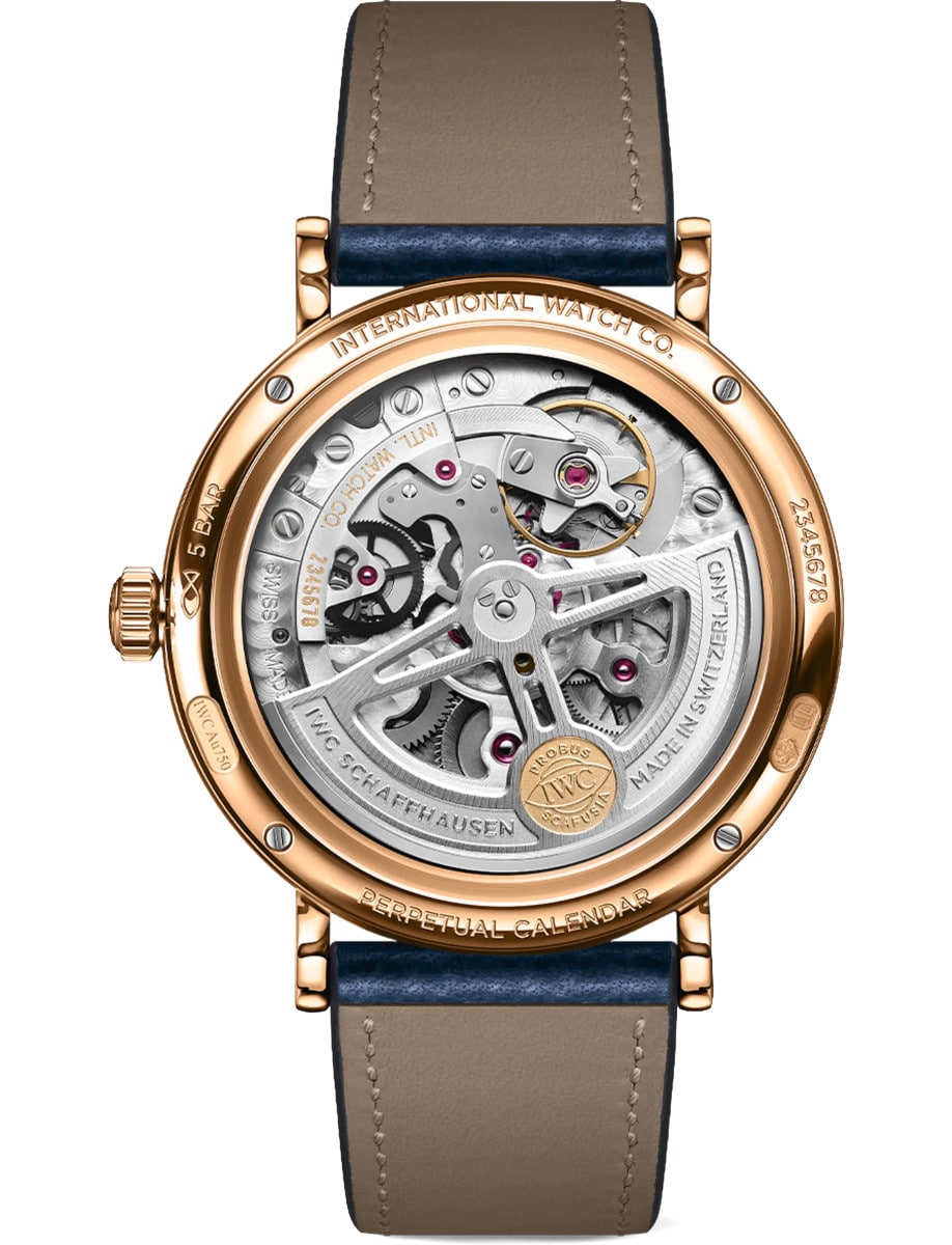 Back view of wristwatch with 18k 5N Gold case with transparent caseback, and blue calfskin leather.