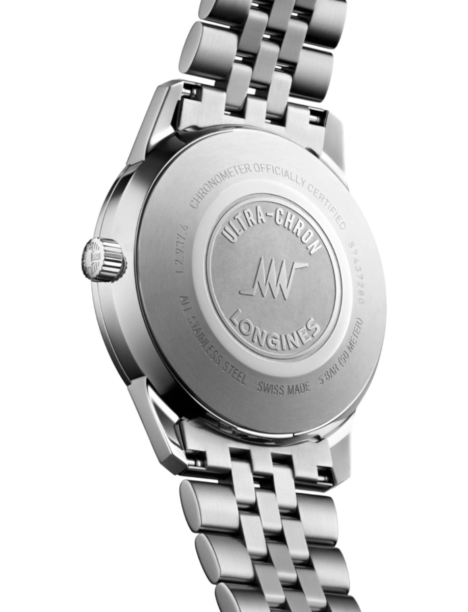 Back view of Longines wristwatch with stainless steel case and bracelet.