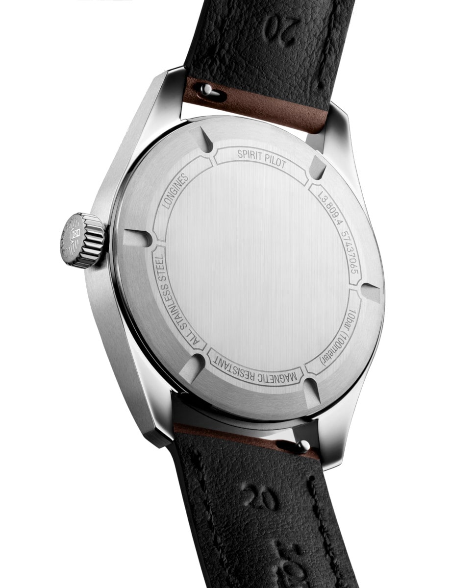 Back view of Longines wristwatch with stainless steel case, and brown leather strap.