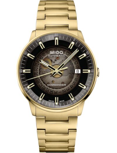 Mido wristwatch with stainless steel with yellow gold colour PVD coating case and bracelet, and black gradient see-through dial.