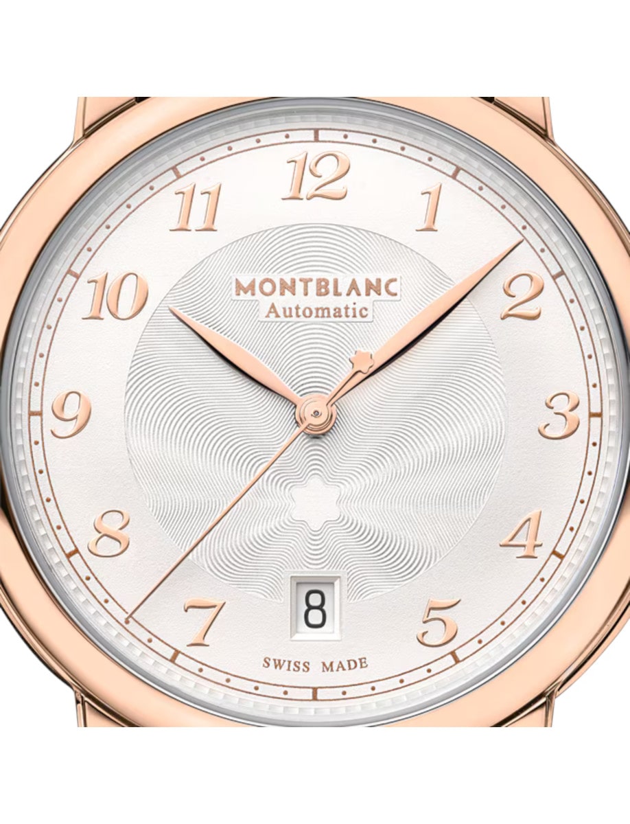 Close view of Montblanc wristwatch with 18k rose gold case, and ivory dial.