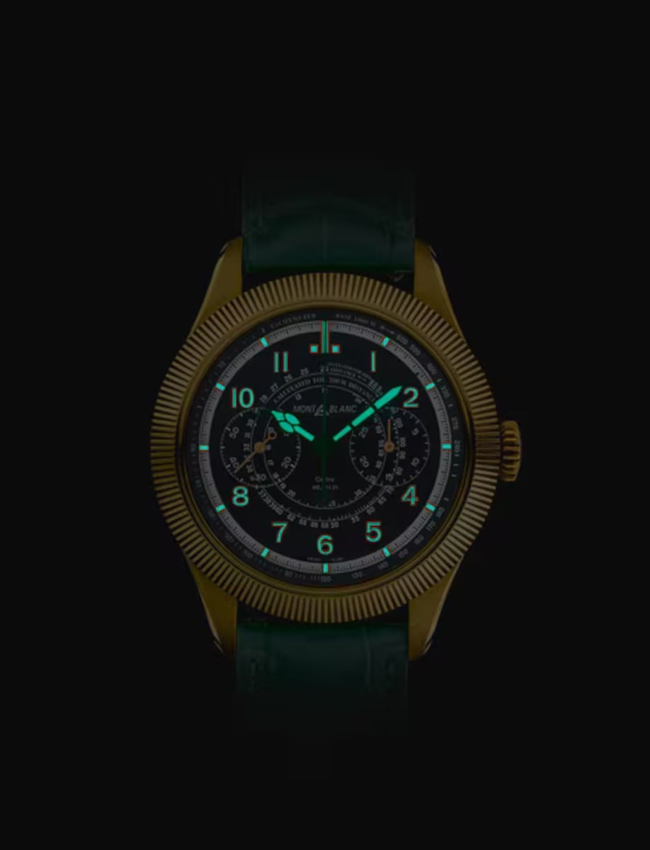 Montblanc wristwatch with 18k Lime Gold case, dark green dial with luminous hands and indexes, and a green interchangeable alligator leather strap.