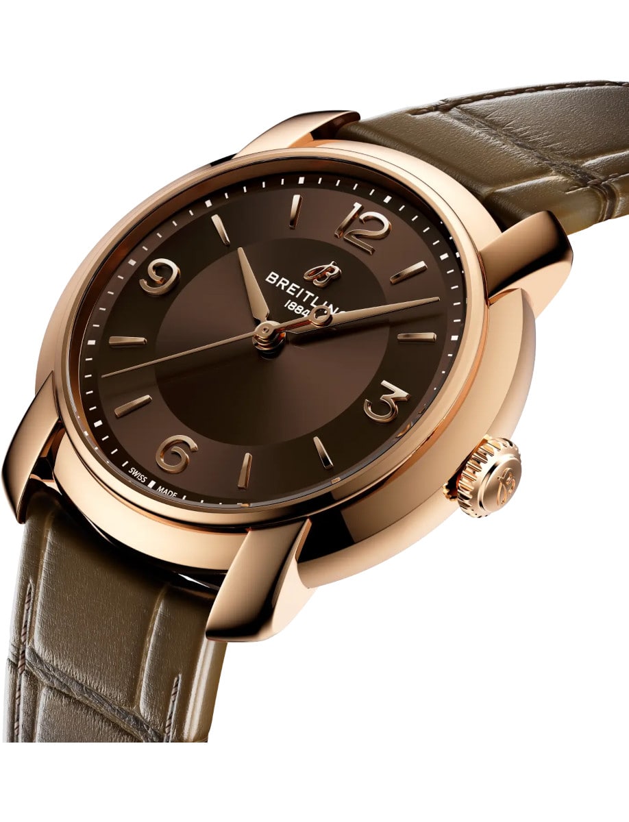 Side view of Breitling wristwatch with 18k red gold, brown dial, and brown alligator leather.