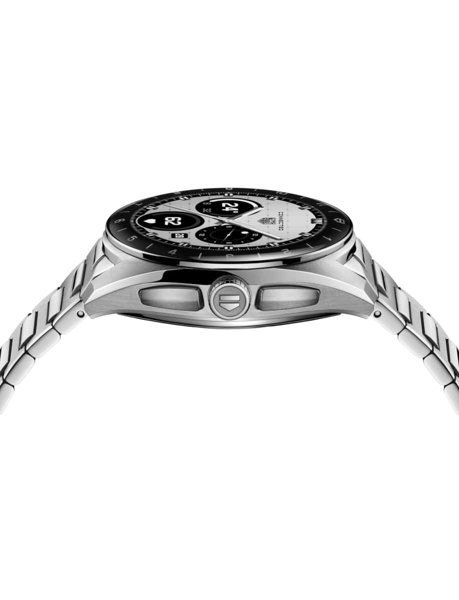 Side view of Tag Heuer wristwatch with stainless steel case and bracelet, OLED display.