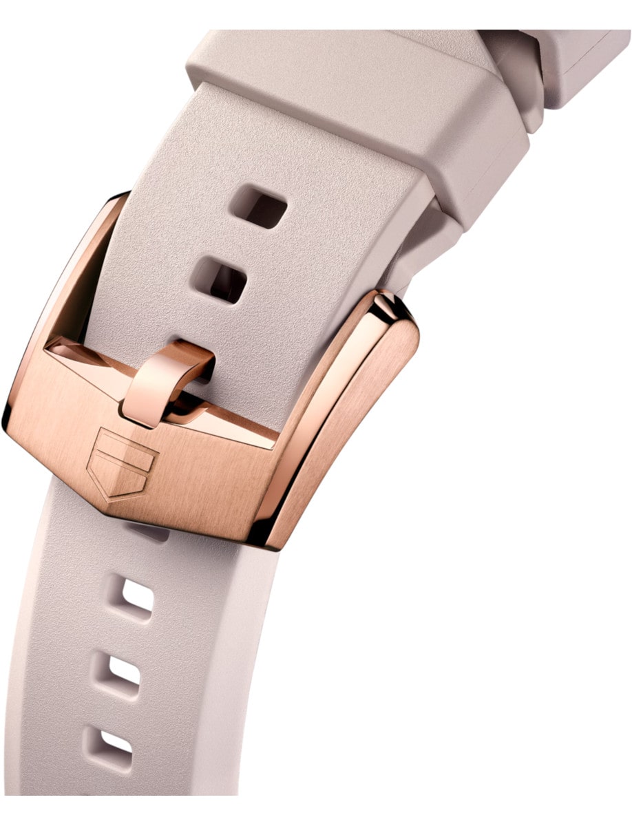 Strap of Tag Heuer wristwatch with pink rubber, with Rose gold pvd plated stainless steel buckle.