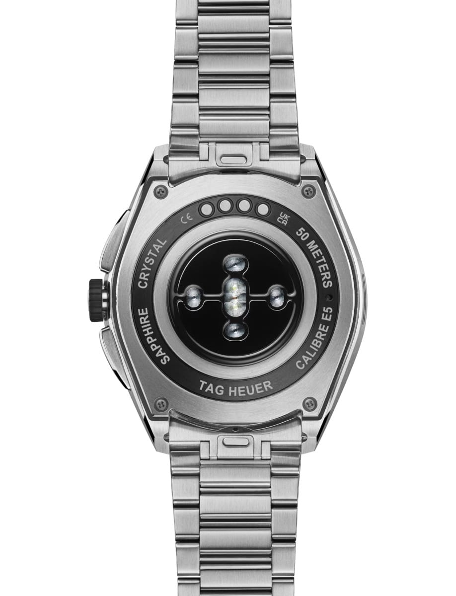 Tag Heuer wristwatch with stainless steel case and bracelet, black ceramic bezel, and grey dial.