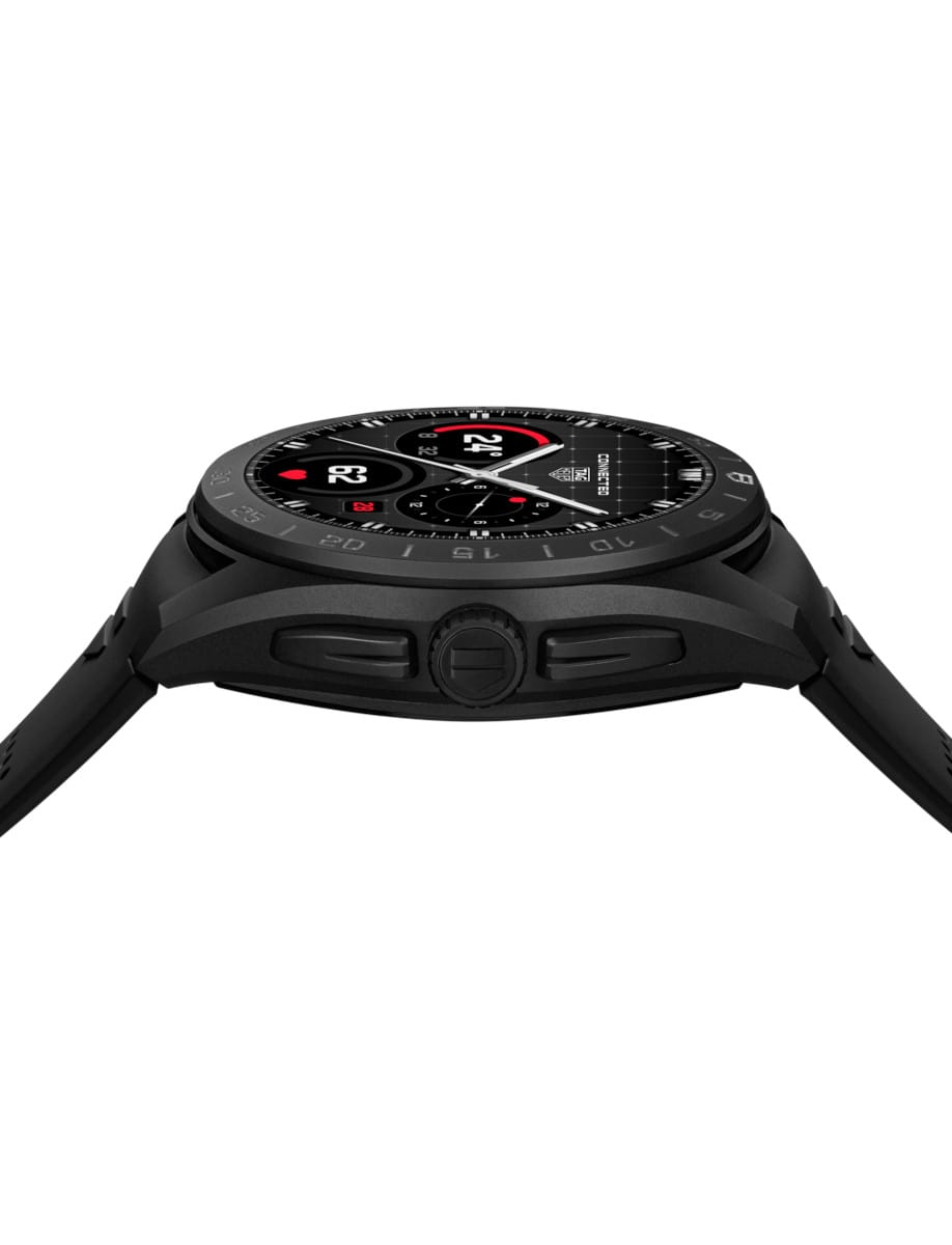 Side view of Tag Heuer wristwatch with black DLC Grade 2 Titanium case, and black rubber strap.