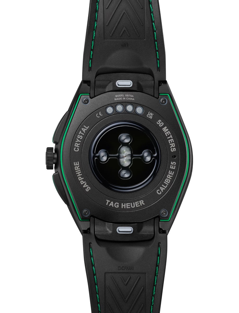 Back view of Tag Heuer wristwatch with Black DLC Grade 2 Titanium case, and white and black rubber strap.