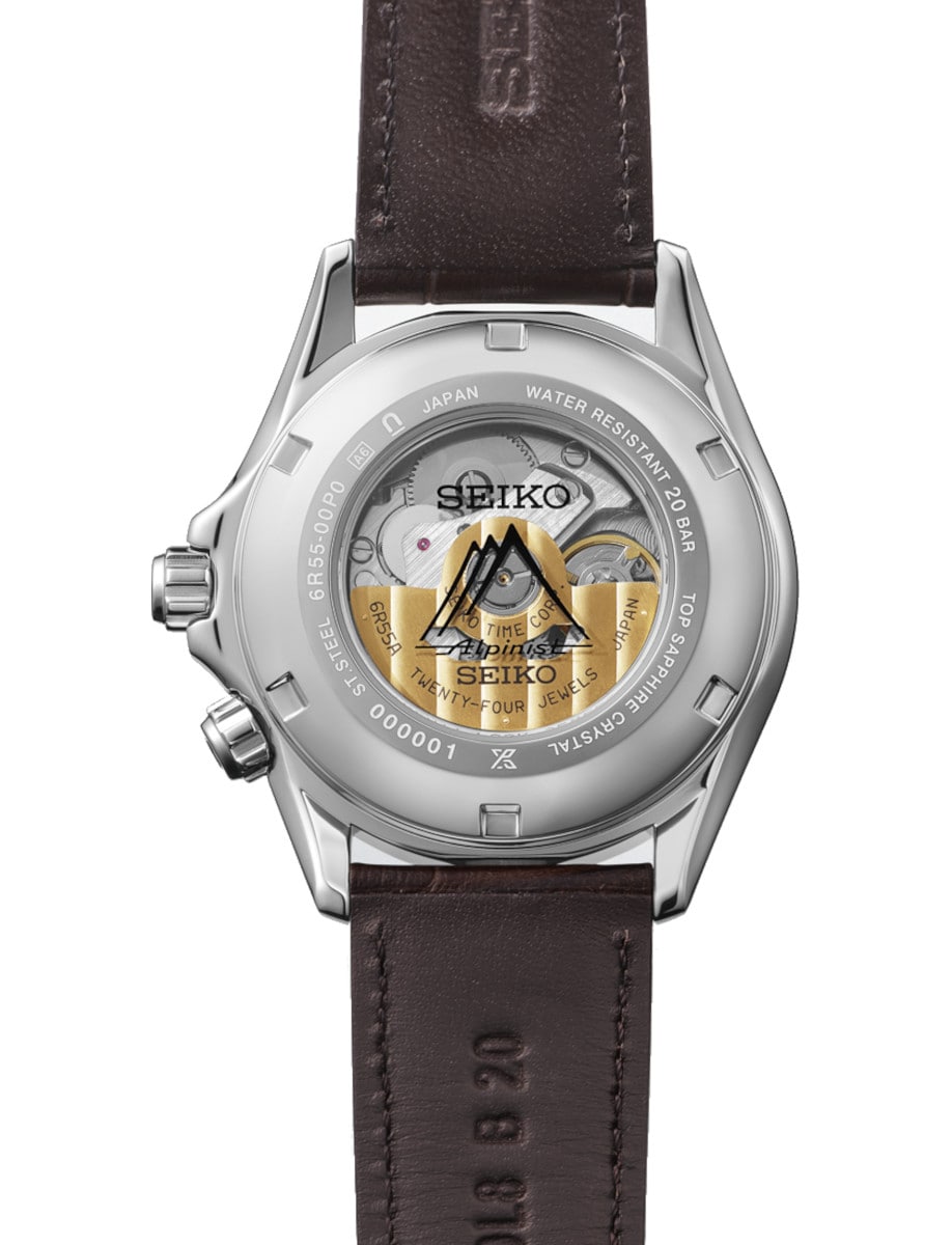 Back view of Seiko wristwatch with stainless steel case with transparent case back, and cow leather strap.