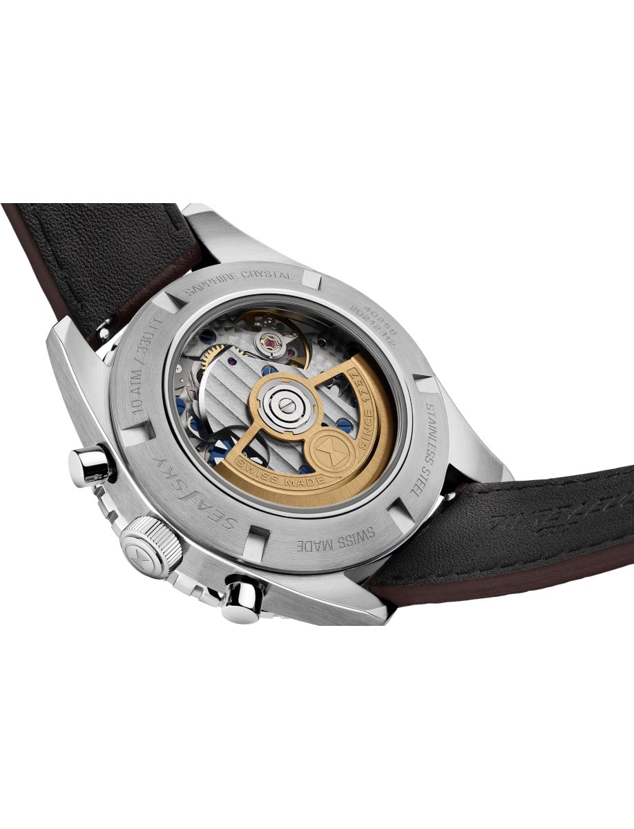 Back view of Favre Leuba wristwatch with stainless steel case, open case back, and brown leather strap.