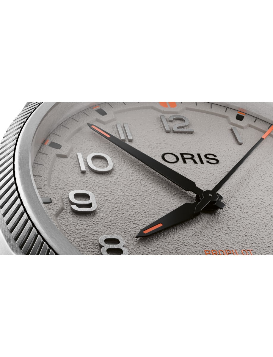 Close view of the dial of Oris wristwatch with beige dial, and hands with SuperLumi-Nova.