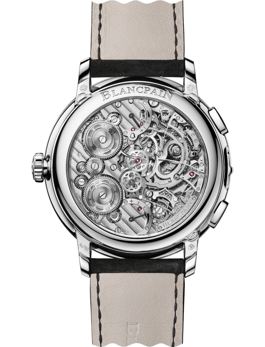 Back view of Blancpain wristwatch with white gold case, open caseback, and alligator leather.