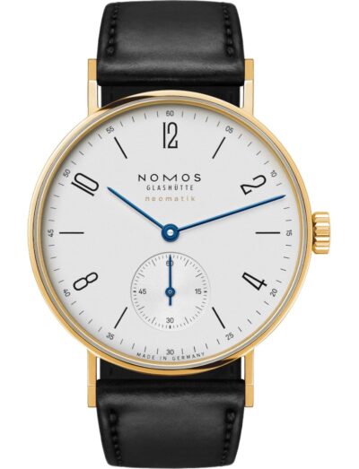 Nomos wristwatch with gold 18k 3N case, white silver-plated dial, and black Horween Genuine Shell Cordovan.