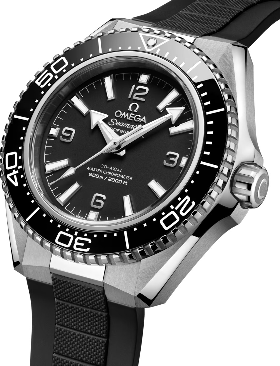 Side view of Omega wristwatch with stainless steel case, black dial and black rubber strap