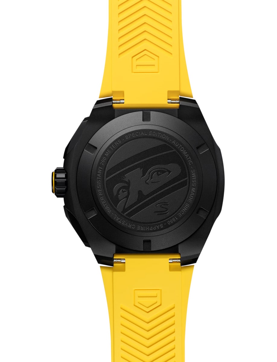 Back view of TAG Heuer wristwatch with DLC titanium case and yellow rubber strap