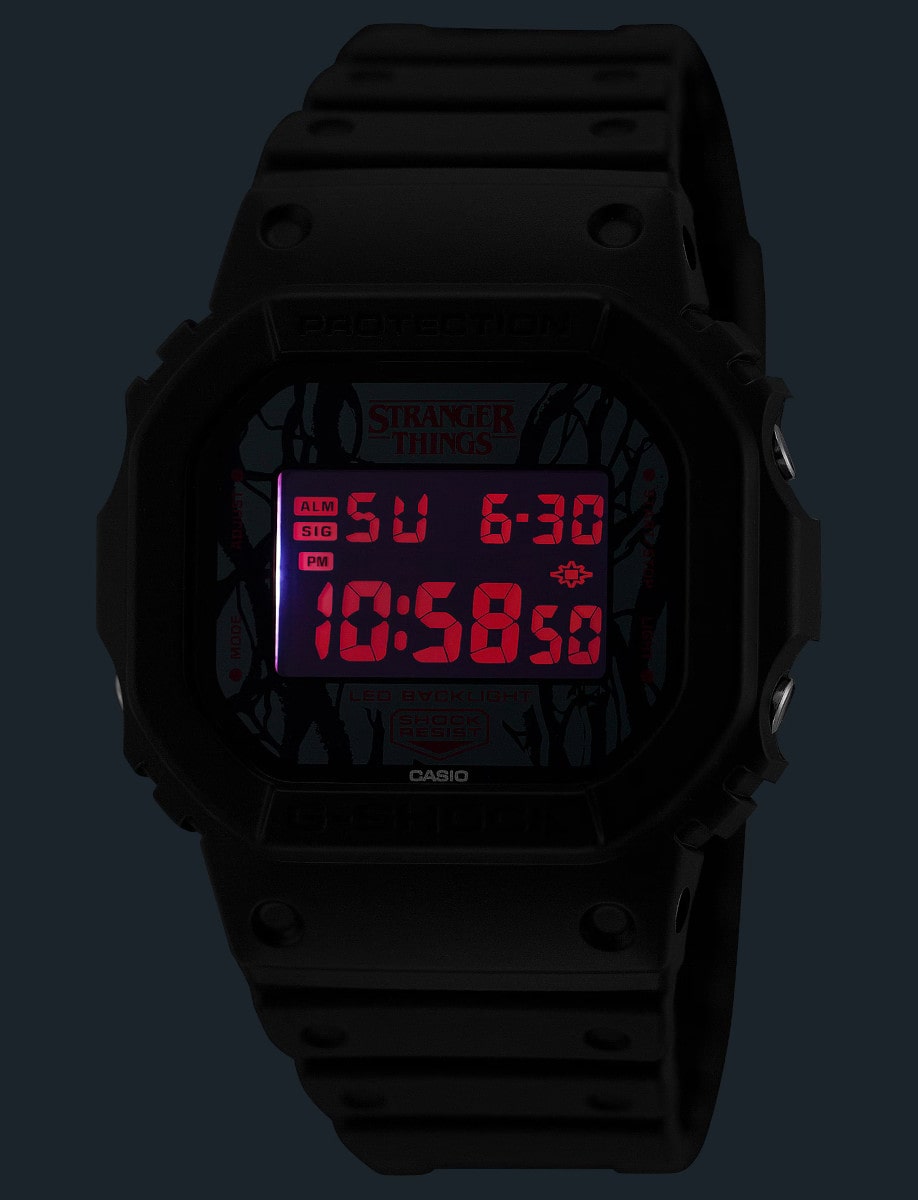 Back view of G-Shock wristwatch with resin case and bracelet, and black digital dial with LED display.