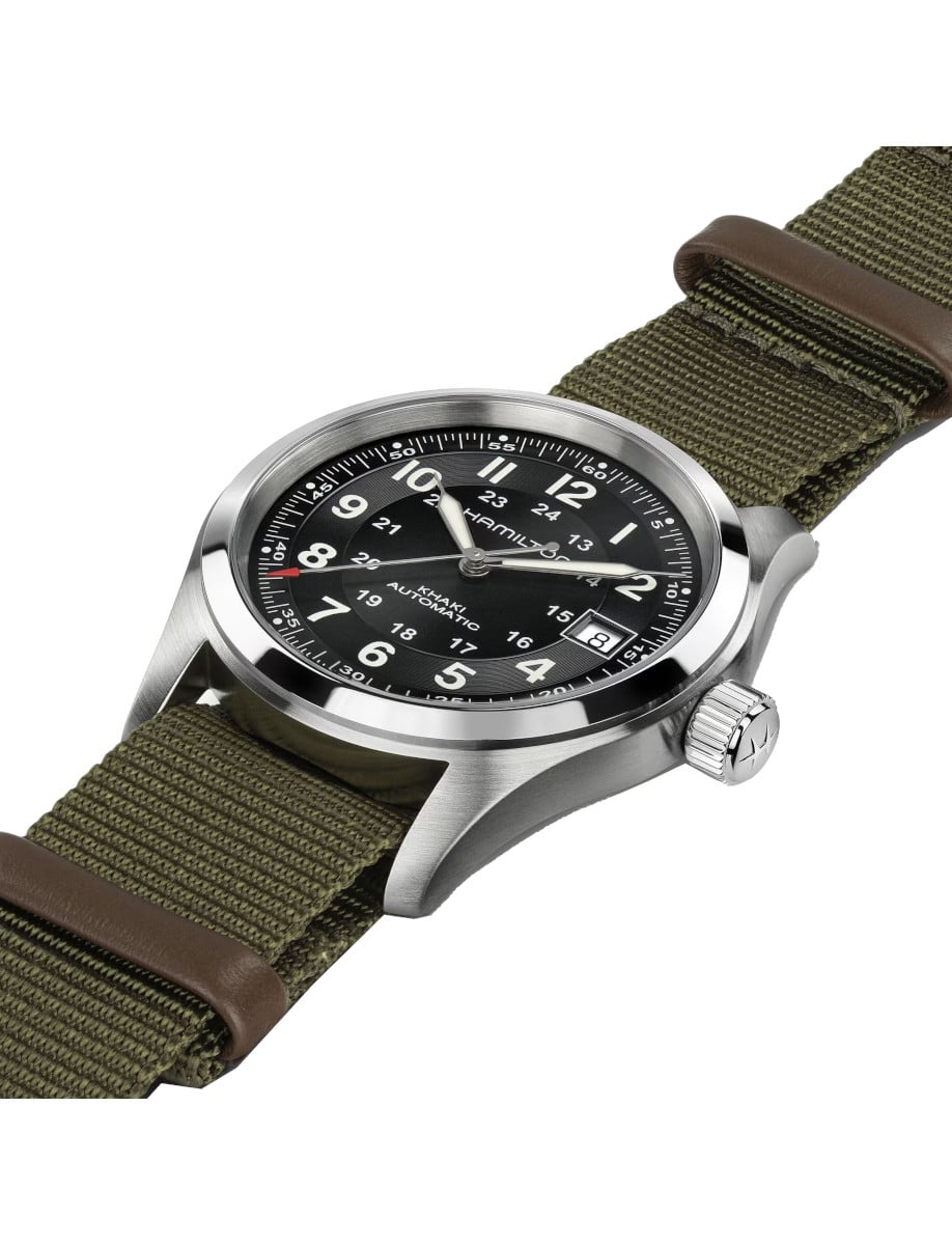 Side view of Hamilton wristwatch with stainless steel case, black dial, and khaki green NATO strap.