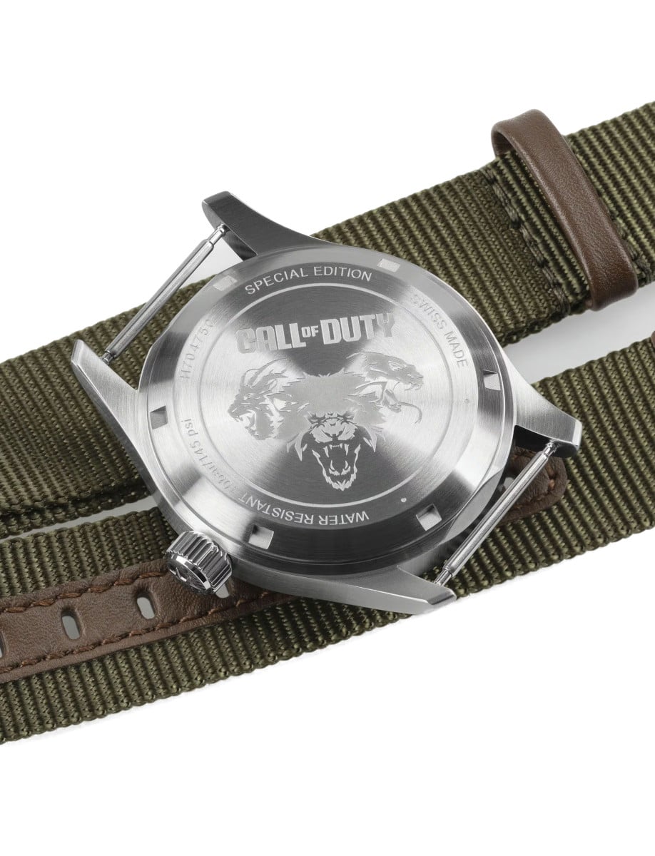 Back view of Hamilton wristwatch with stainless steel case, solid case back, and khaki green NATO strap.