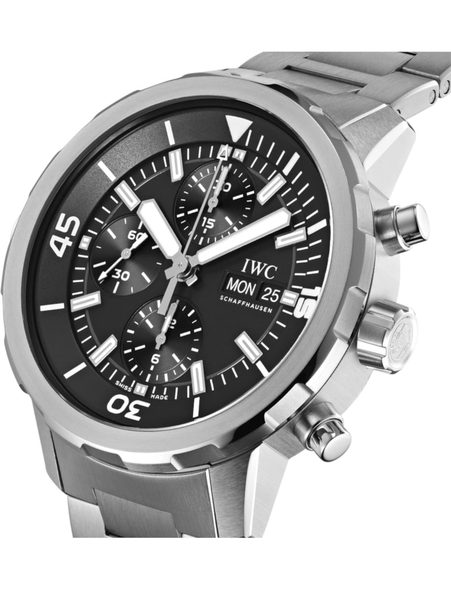 Side view of IWC wristwatch with stainless steel case and bracelet, and black dial.