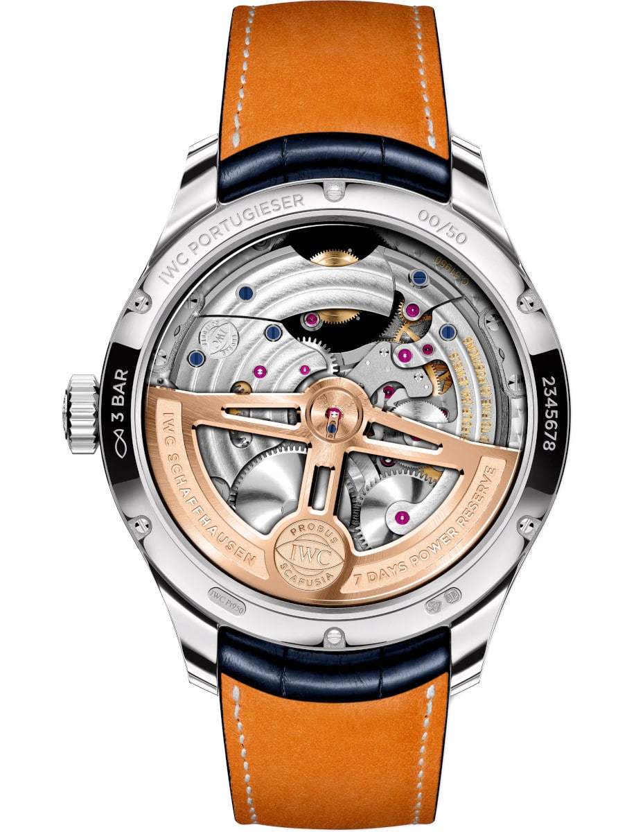 Back view of IWC wristwatch with platinum case, open case back, Blue alligator leather strap by Santoni.