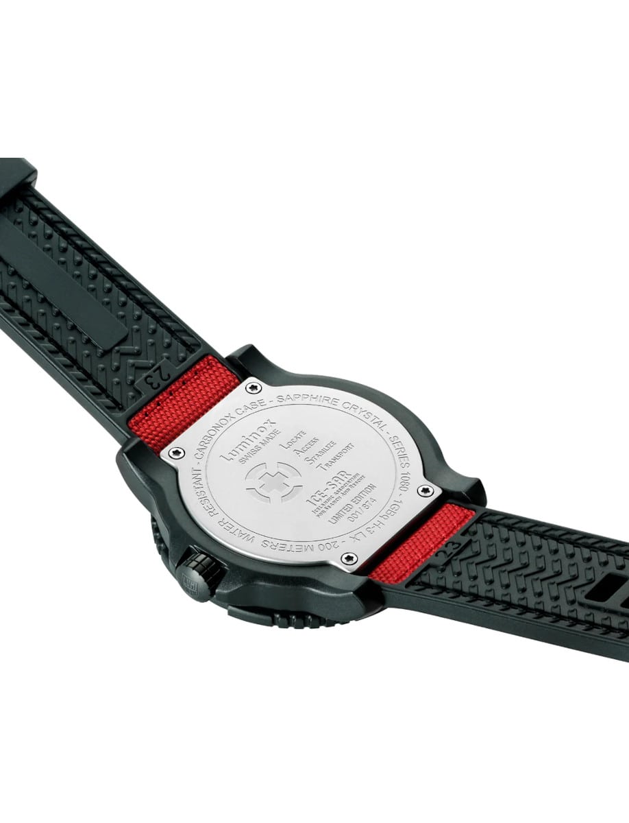 Back view of Luminox wristwatch with CARBONOX case, and red rubber strap.
