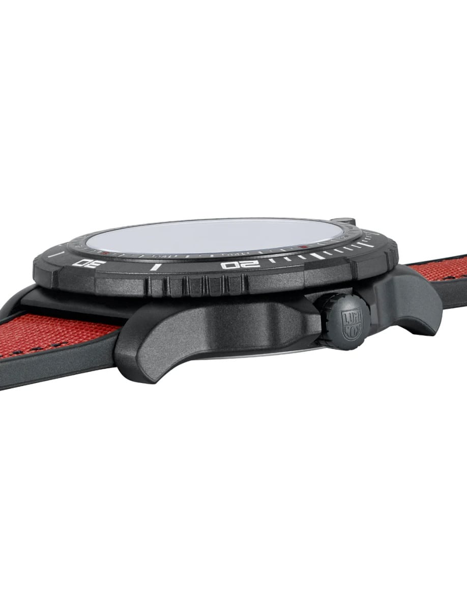 Side view of Luminox wristwatch with CARBONOX case, and red rubber strap.