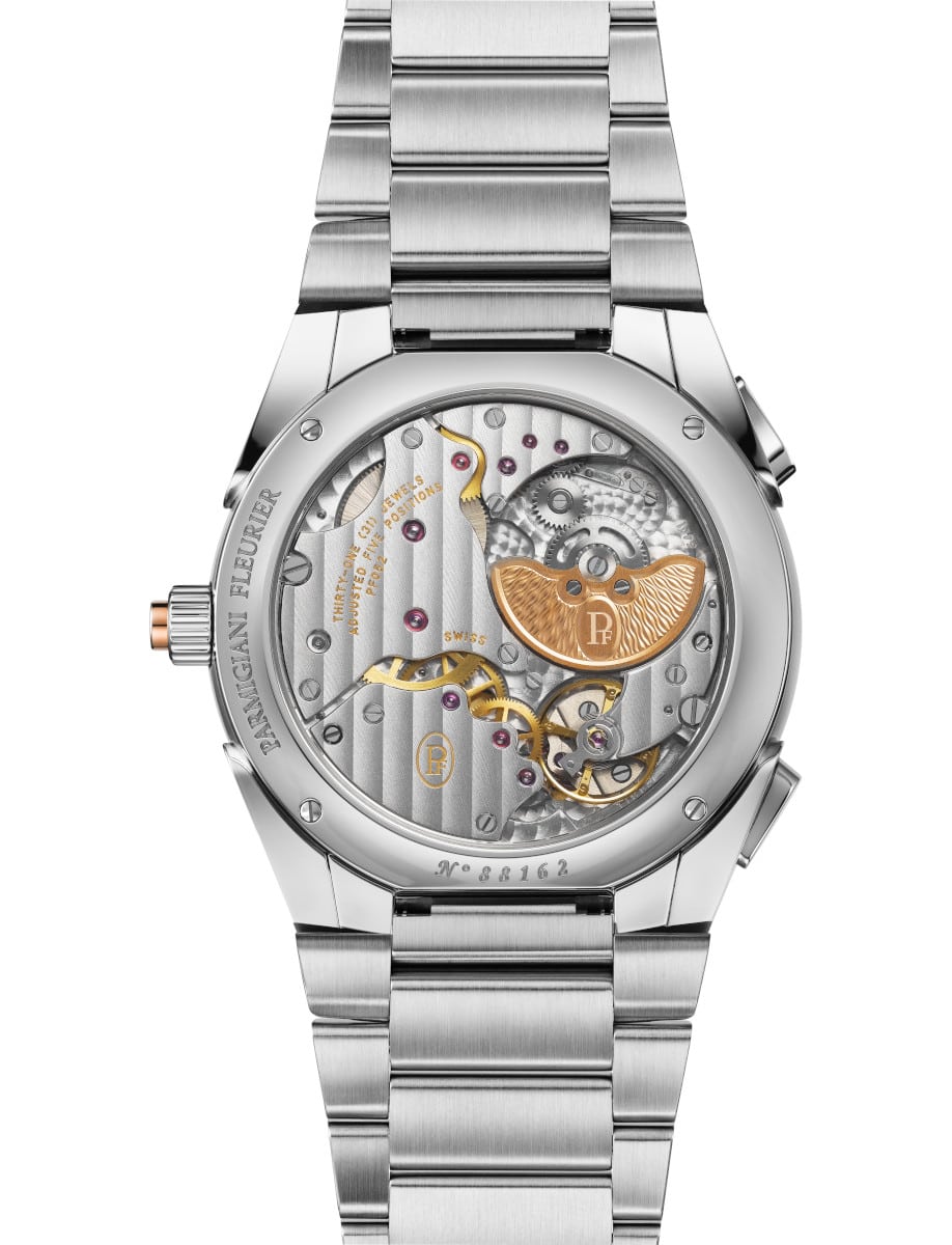 Back view of Parmigiani Fleurier wristwatch with stainless steel case and bracelet, and open case back.