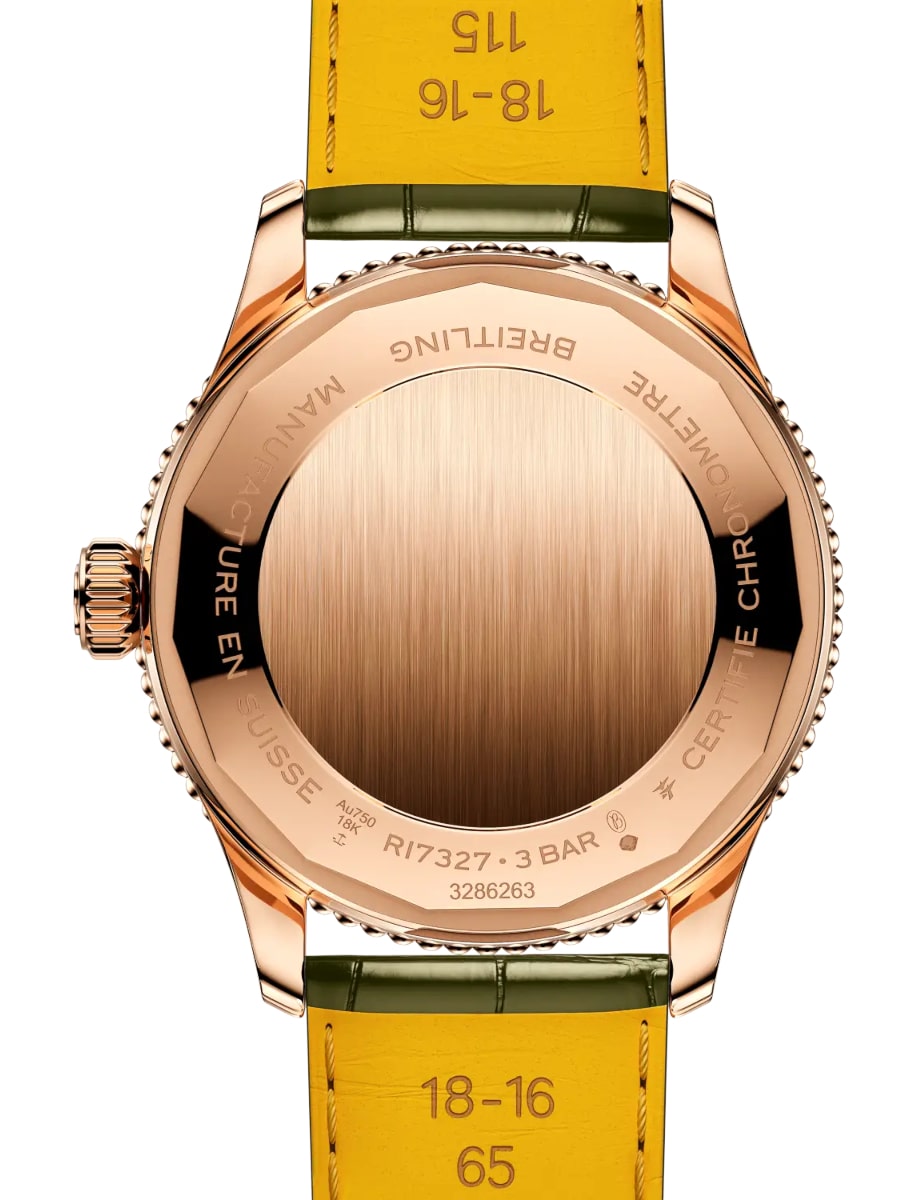 Back view of Breitling wristwatch with 18k red gold case, green dial and alligator leather strap