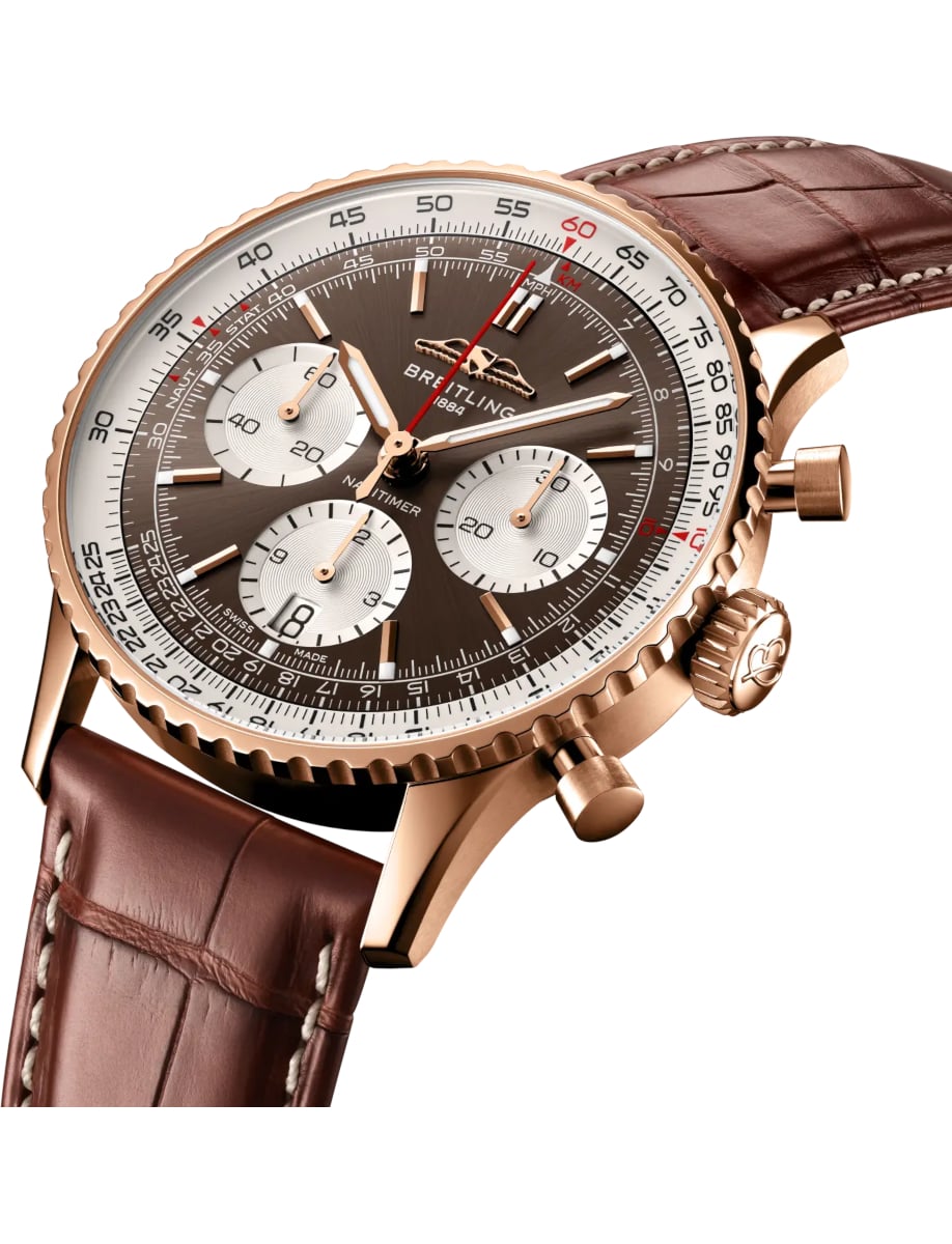 Side view of Breitling wristwatch with 18k red gold case, copper dial and alligator leather strap
