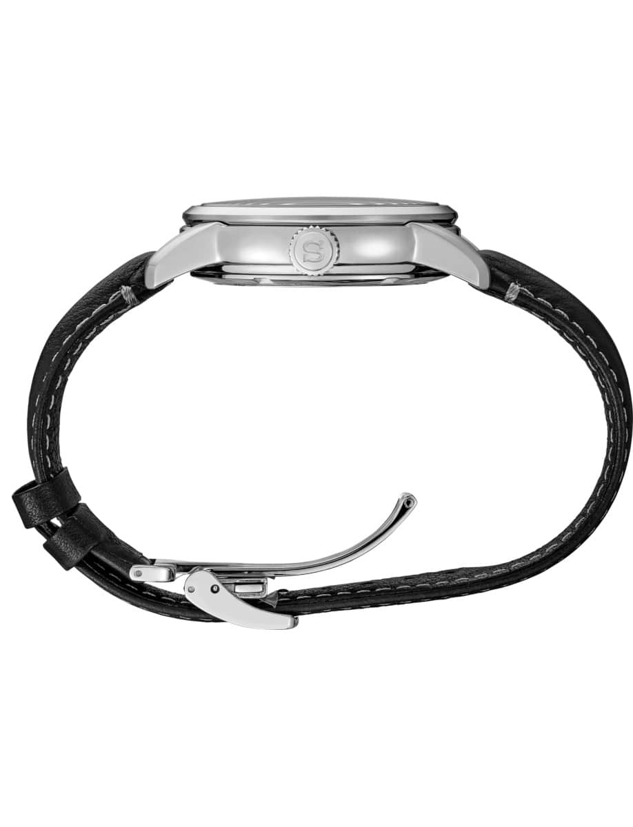 Side view of Seiko Luxe wristwatch with stainless steel case and black leather strap