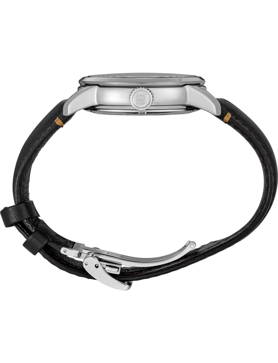 Side view of Seiko Luxe wristwatch with stainless steel case and black leather strap