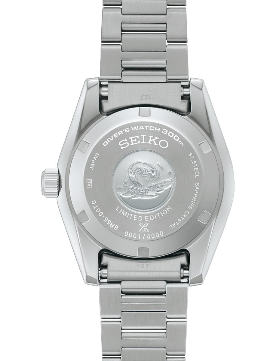 Back view of Seiko wristwatch with stainless steel case and bracelet, and solid case back..