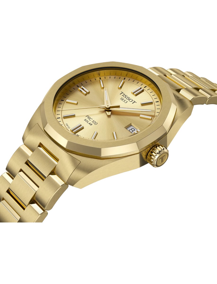 Side view of Tissot wristwatch with 316L stainless steel case and bracelet with yellow gold PVD coating, and champagne dial.