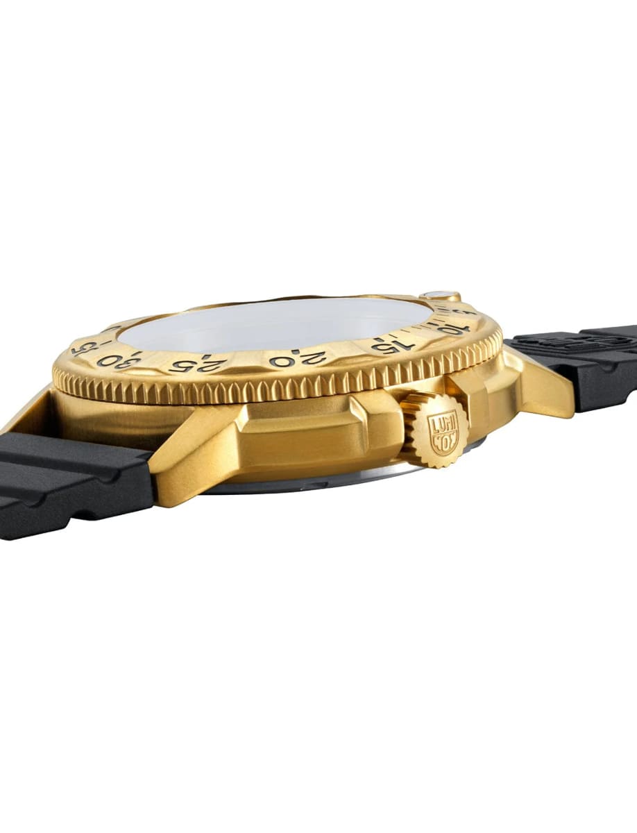 Side view of Luminox wristwatch with gold stainless steel case, black dial and black rubber strap