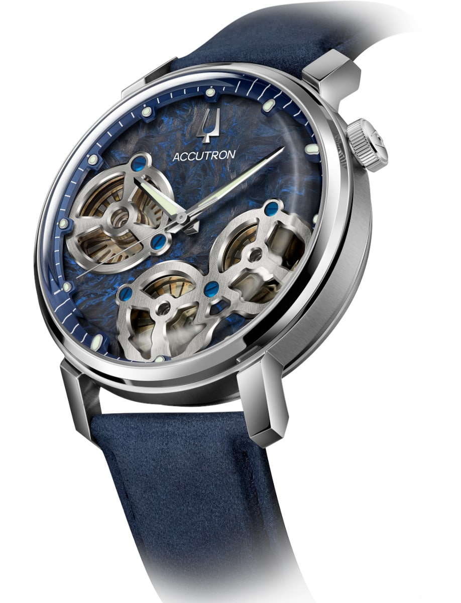 Side view of Accutron wristwatch with stainless steel case, blue dial. and blue suede leather strap.