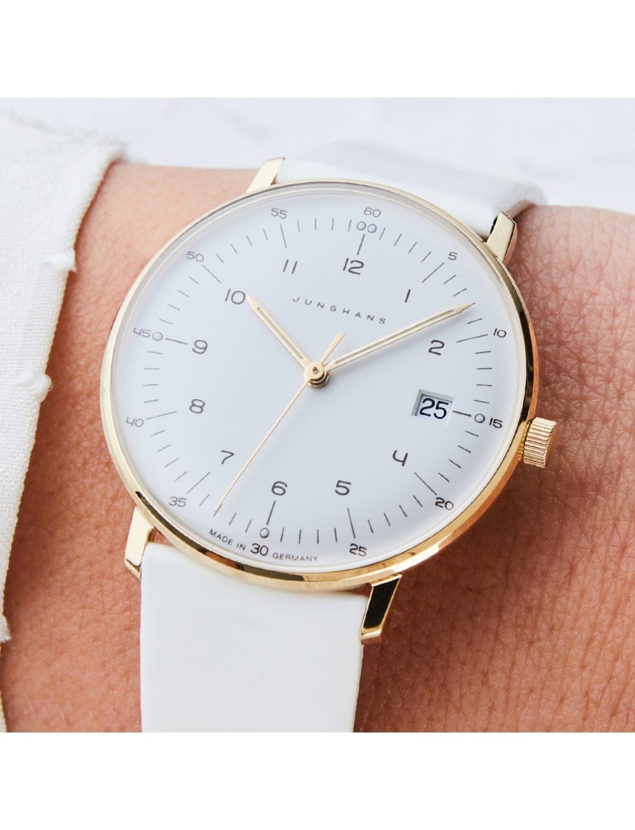Side view of Junghans wristwatch with stainless steel case, matt white dial, and white leather strap.
