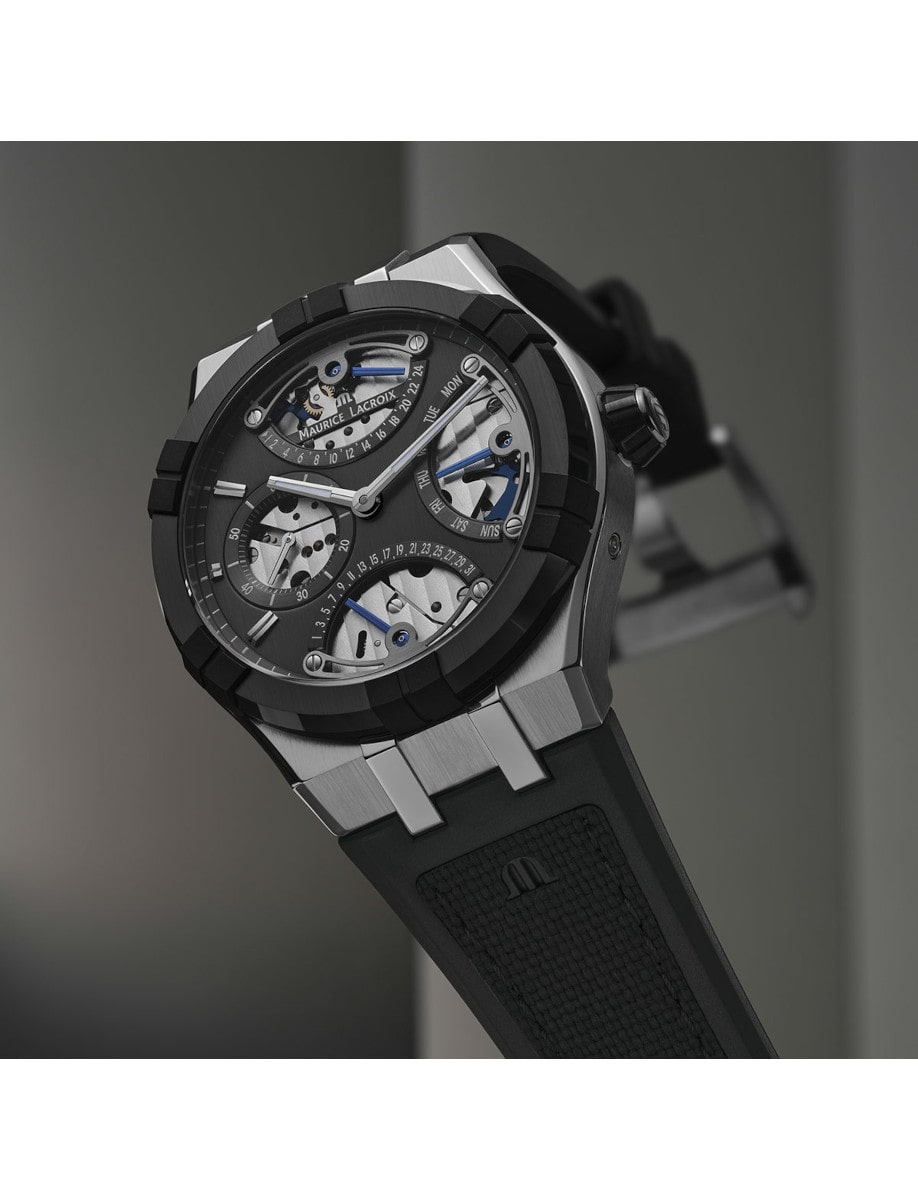 Side view of Maurice Lacroix wristwatch with stainless steel case, anthracite dial, and rubber strap.