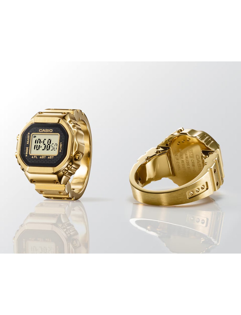 Front and back view of Casio ring watch in gold ion plated stainless steel and digital display.