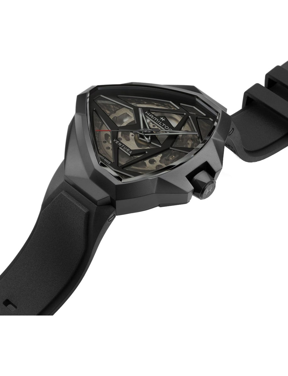 Side view of Hamilton wristwatch with PVD black stainless steel case, black rubber strap, and skeleton dial.