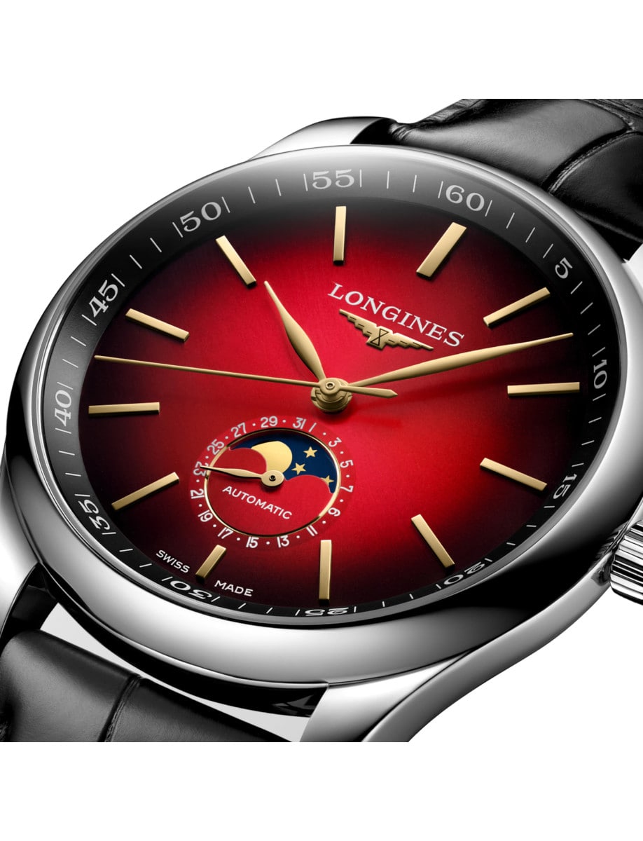 Side view of Longines wristwatch with stainless steel case, sunray red gradient dial, and black leather strap.