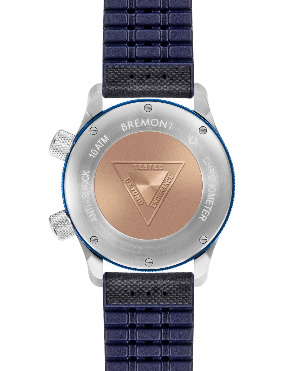 Back view of Bremont wristwatch with stainless steel case, and blue leather strap.