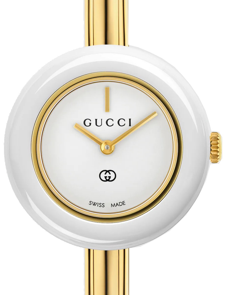 Gucci wristwatch with yellow gold plated stainless steel case and bangle, and white dial and bezel.
