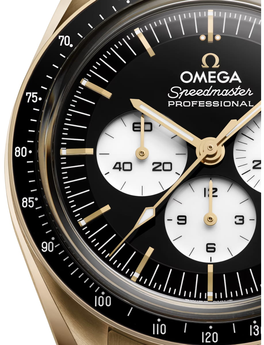 Closer view of Omega wristwatch with Moonshine™ gold case and bracelet and black dial