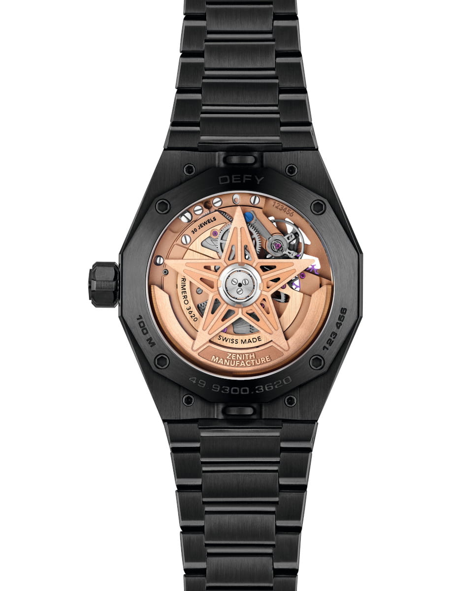 Back view of Zenith wristwatch with black ceramic case and bracelet, and gold-tone openworked dial.