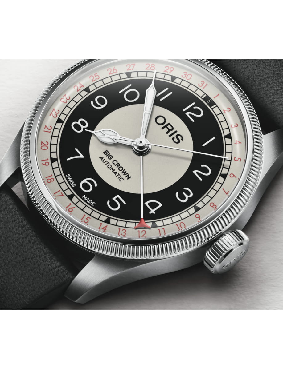 Closer look of Oris wristwatch with stainless steel case, gray and black dial and black leather strap