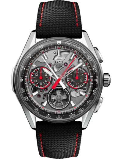 Tag Heuer wristwatch with stainless steel case, transparent dial, and black rubber and leather strap.