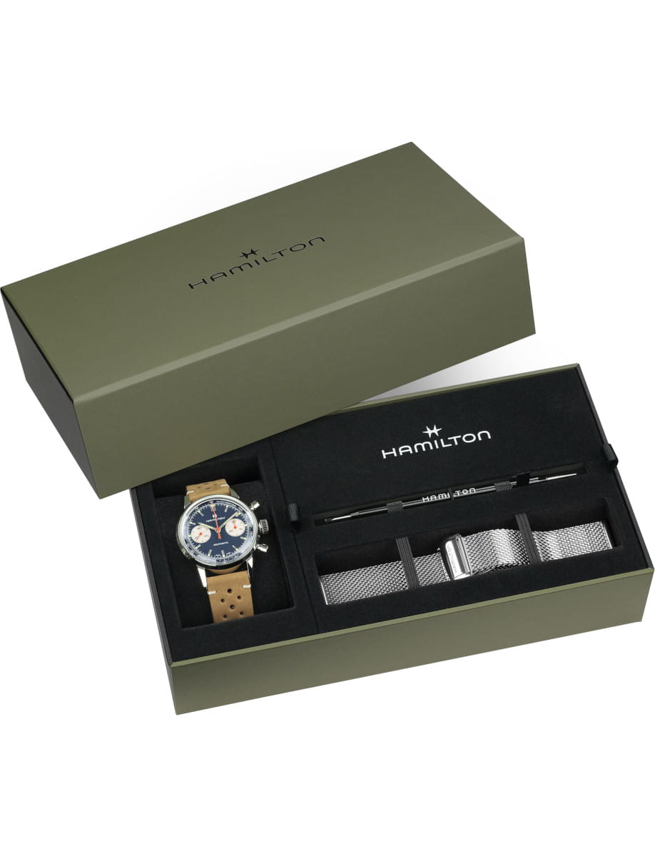 Box view of Hamilton wristwatch with stainless steel case, blue dial, and a brown leather strap.